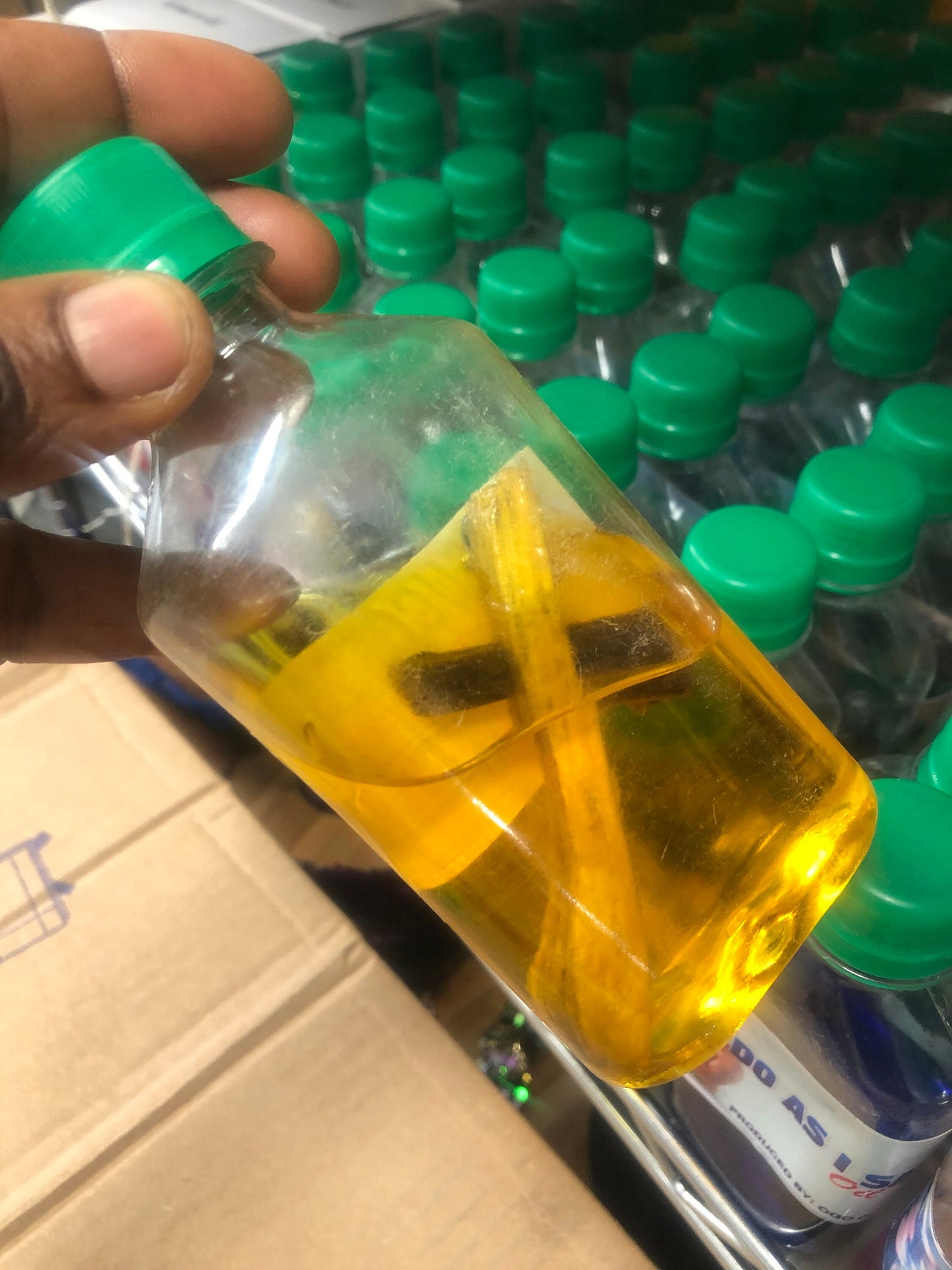 Success oil with cross inside