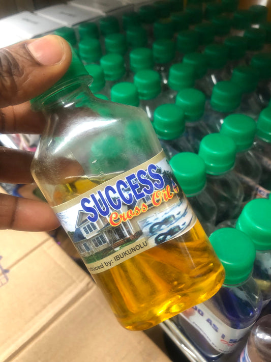 Success oil with cross inside